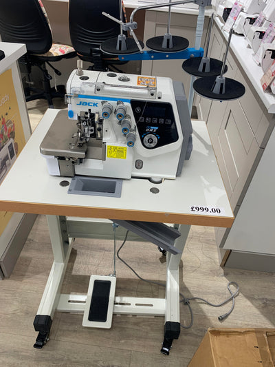 Jack Urus 4 thread overlocker with a small top and stand